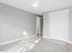 Bright bedroom with double doors and ceiling fan at 520 S Bloodworth St, Raleigh, NC 27601