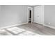 Bedroom with double doors leading to en-suite bathroom at 520 S Bloodworth St, Raleigh, NC 27601