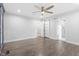 Bedroom with hardwood floors, barn door, and ensuite bath at 520 S Bloodworth St, Raleigh, NC 27601