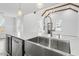 Modern kitchen with farmhouse sink and stainless steel appliances at 520 S Bloodworth St, Raleigh, NC 27601
