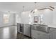 Modern kitchen with stainless steel appliances and an island at 520 S Bloodworth St, Raleigh, NC 27601