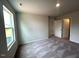 Bedroom with carpeting and a bright window at 60 Cordoba Dr, Franklinton, NC 27525