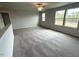 Bonus room featuring carpet and three large windows at 60 Cordoba Dr, Franklinton, NC 27525