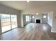 Spacious living room with hardwood floors and a cozy fireplace at 60 Cordoba Dr, Franklinton, NC 27525
