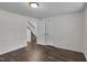 Neutral basement featuring hardwood floors and a staircase at 621 Shepard School Rd, Zebulon, NC 27597
