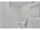 Clean bathroom featuring white cabinets, tile flooring, and a shower and tub combo at 621 Shepard School Rd, Zebulon, NC 27597
