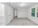 This is a bedroom with a small window and closet at 621 Shepard School Rd, Zebulon, NC 27597