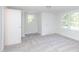 Charming bedroom featuring carpet, a closet, and windows at 621 Shepard School Rd, Zebulon, NC 27597