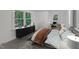 Cozy bedroom featuring neutral walls, a bed, and a desk at 621 Shepard School Rd, Zebulon, NC 27597