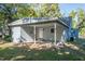 Detached garage with covered carport and concrete slab at 621 Shepard School Rd, Zebulon, NC 27597