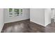 Bright living room with large windows and new flooring at 621 Shepard School Rd, Zebulon, NC 27597