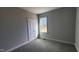 Bright bedroom with a closet, and a window at 65 Leisure Ln, Louisburg, NC 27549