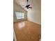 Bright bedroom with laminate wood flooring at 7309 Brighton Hill Ln, Raleigh, NC 27616