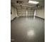Two-car garage with epoxy coated flooring at 7309 Brighton Hill Ln, Raleigh, NC 27616