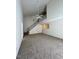 High ceiling living room with loft and neutral carpet at 7309 Brighton Hill Ln, Raleigh, NC 27616