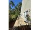 Small patio with landscaping and privacy fence at 7309 Brighton Hill Ln, Raleigh, NC 27616