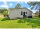 View of the back of the house and the spacious backyard at 816 Peyton St, Raleigh, NC 27610