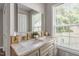 Modern bathroom with dual vanity and granite countertop at 816 Peyton St, Raleigh, NC 27610