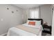 Calm bedroom with queen bed, nightstand, and decor at 816 Peyton St, Raleigh, NC 27610