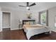 Bright bedroom with large windows and ceiling fan at 816 Peyton St, Raleigh, NC 27610