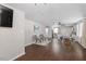 Open floor plan with hardwood floors, dining area and kitchen access at 816 Peyton St, Raleigh, NC 27610