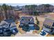 Aerial view of two-story house with driveway and landscaping at 90 Cordova St, Clayton, NC 27527