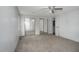 Primary bedroom with mirrored closet doors and access to bathroom at 95 Old Barn Ct, Rocky Mount, NC 27801