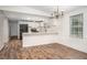 Modern kitchen with white cabinets and black appliances at 95 Old Barn Ct, Rocky Mount, NC 27801