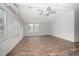 Bright living room featuring hardwood floors and neutral walls at 95 Old Barn Ct, Rocky Mount, NC 27801