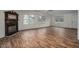 Spacious living room with hardwood floors and a fireplace at 95 Old Barn Ct, Rocky Mount, NC 27801