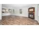 Open living space with kitchen and fireplace views at 95 Old Barn Ct, Rocky Mount, NC 27801