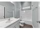 Bathroom featuring a vanity with sink, toilet, and shower-tub combo at 101 Pointe Park Cir, Holly Springs, NC 27540