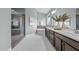 Bathroom featuring dual sink vanity, soaking tub, and glass enclosed shower at 101 Pointe Park Cir, Holly Springs, NC 27540