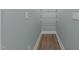 Walk-in closet featuring adjustable white wire shelving and neutral walls at 101 Pointe Park Cir, Holly Springs, NC 27540