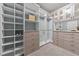 Spacious closet with custom shelving, drawers and mirror offers organized storage space at 101 Pointe Park Cir, Holly Springs, NC 27540