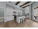 Modern basement kitchen with white cabinets and island at 101 Pointe Park Cir, Holly Springs, NC 27540