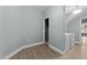 Laundry room with a washer and dryer hookups and unfinished storage area at 101 Pointe Park Cir, Holly Springs, NC 27540
