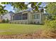 Beautiful back porch overlooking the landscaped yard at 1304 Ivy Ln, Raleigh, NC 27609