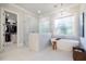 Bathroom features a soaking tub, walk-in shower, and large closet at 1304 Ivy Ln, Raleigh, NC 27609