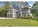 Stunning two-story home featuring a landscaped front yard and a convenient two-car garage at 1304 Ivy Ln, Raleigh, NC 27609