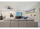 Spacious Gathering room featuring a large sectional sofa and a flat-screen TV at 1304 Ivy Ln, Raleigh, NC 27609