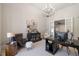 Spacious home office with a large desk and comfortable seating at 1304 Ivy Ln, Raleigh, NC 27609