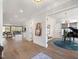 Open floor plan with hardwood floors, showcasing the living and dining areas at 1304 Ivy Ln, Raleigh, NC 27609