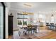 Bright kitchen features white cabinets, stainless steel appliances, and an island at 1304 Ivy Ln, Raleigh, NC 27609