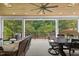 A covered patio with dining and sitting areas offers a great place to unwind at 1304 Ivy Ln, Raleigh, NC 27609