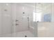 Spa-like shower with glass enclosure and built-in bench at 1304 Ivy Ln, Raleigh, NC 27609