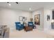 Cozy sitting area with two armchairs and a wooden coffee table at 1304 Ivy Ln, Raleigh, NC 27609