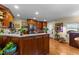 Kitchen with granite countertops, island, and stainless steel appliances at 1560 S Hollybrook Rd, Wendell, NC 27591