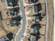 Aerial view of homes and street at 2120 Blue Iris Way, Zebulon, NC 27597