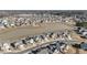 Aerial view of neighborhood and lake at 2120 Blue Iris Way, Zebulon, NC 27597